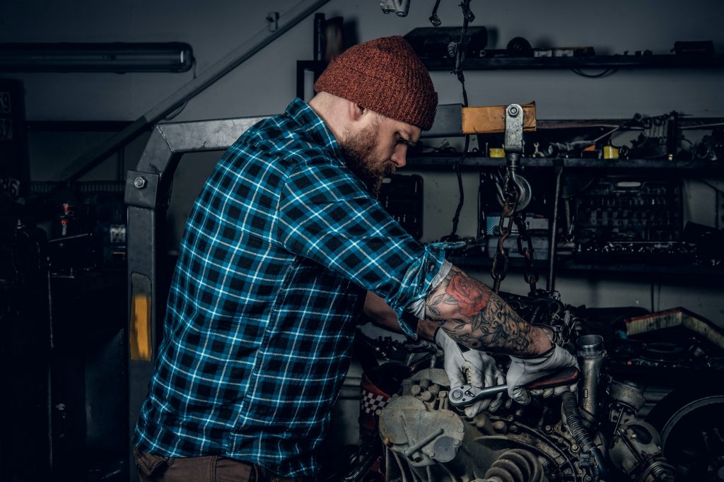 Mechanic man in a garage.